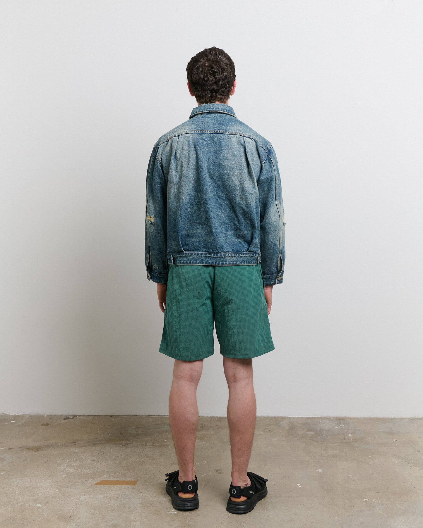 Distressed denim jacket