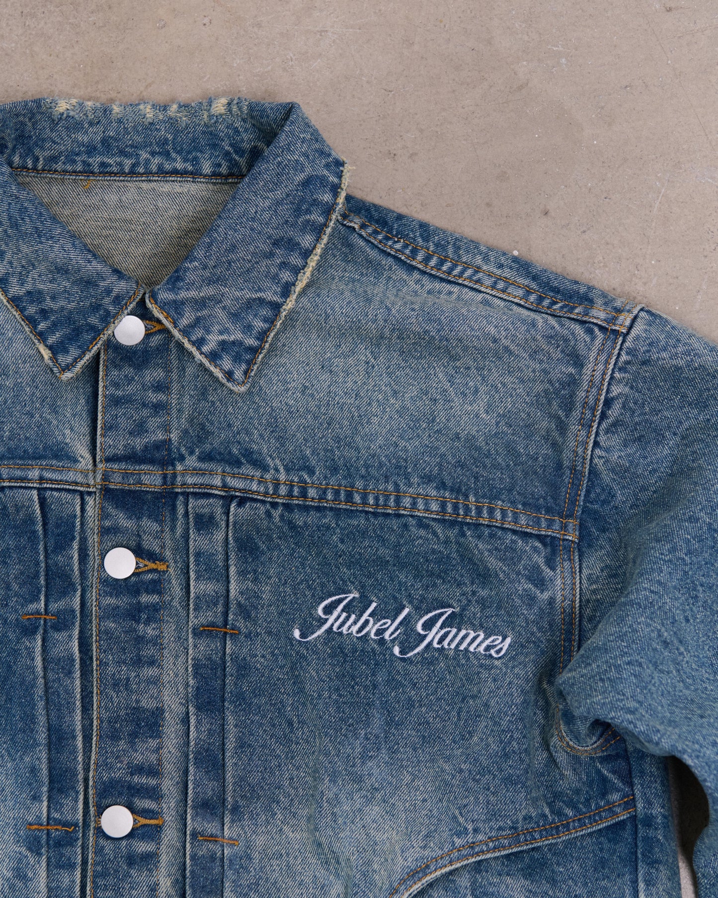 Distressed denim jacket