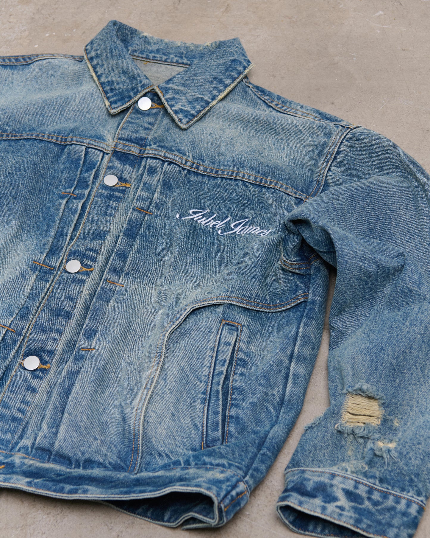 Distressed denim jacket